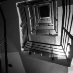 A long staircase highlighting three levels of supply chain