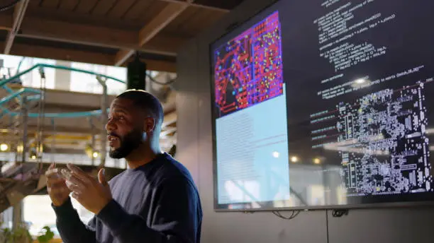 A tech expert showcasing solutions for risk mitigations